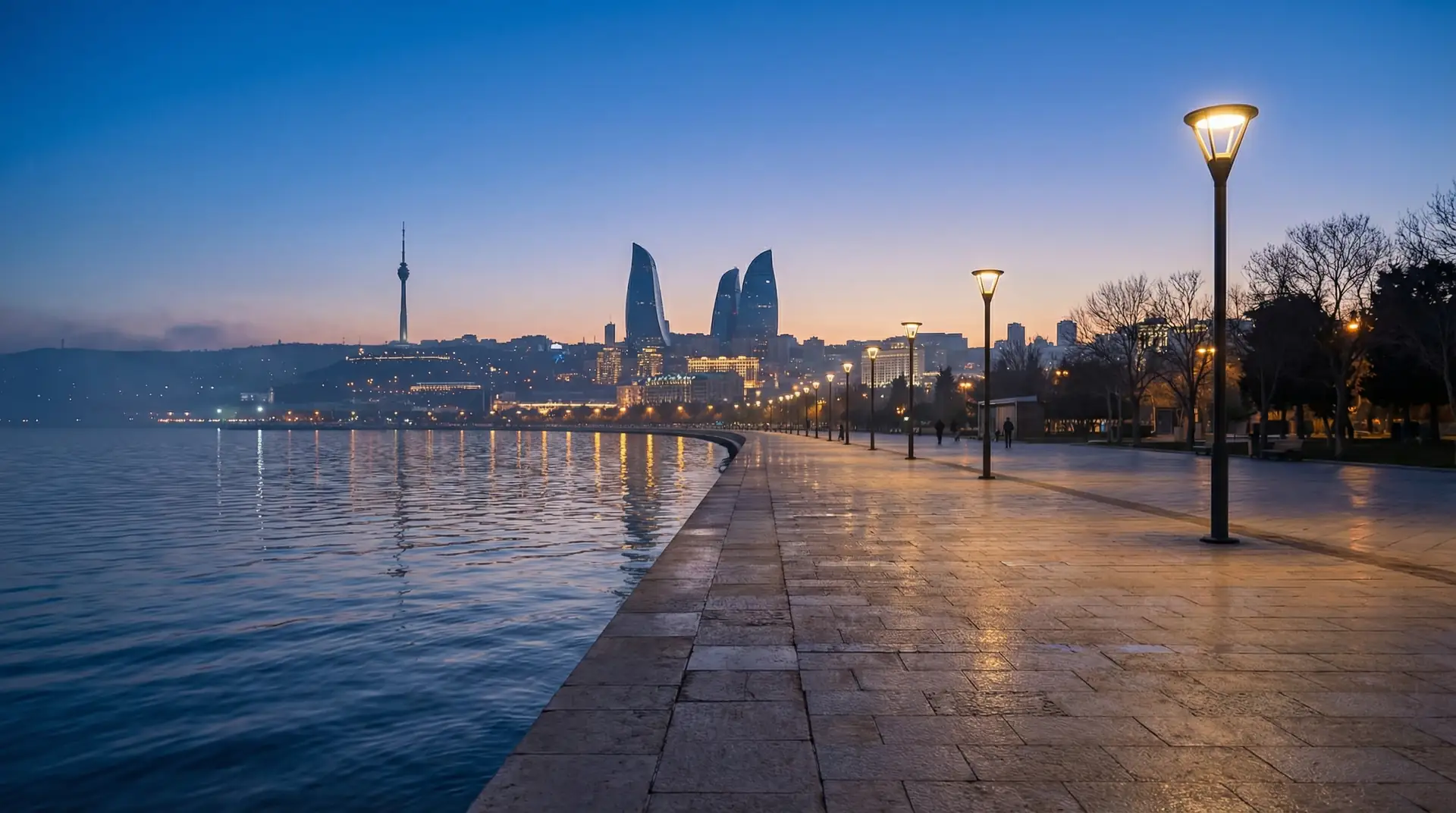 Flame Towers and modern Baku skyline along the Caspian Sea in Azerbaijan — OraVisa Azerbaijan visa services from Dubai