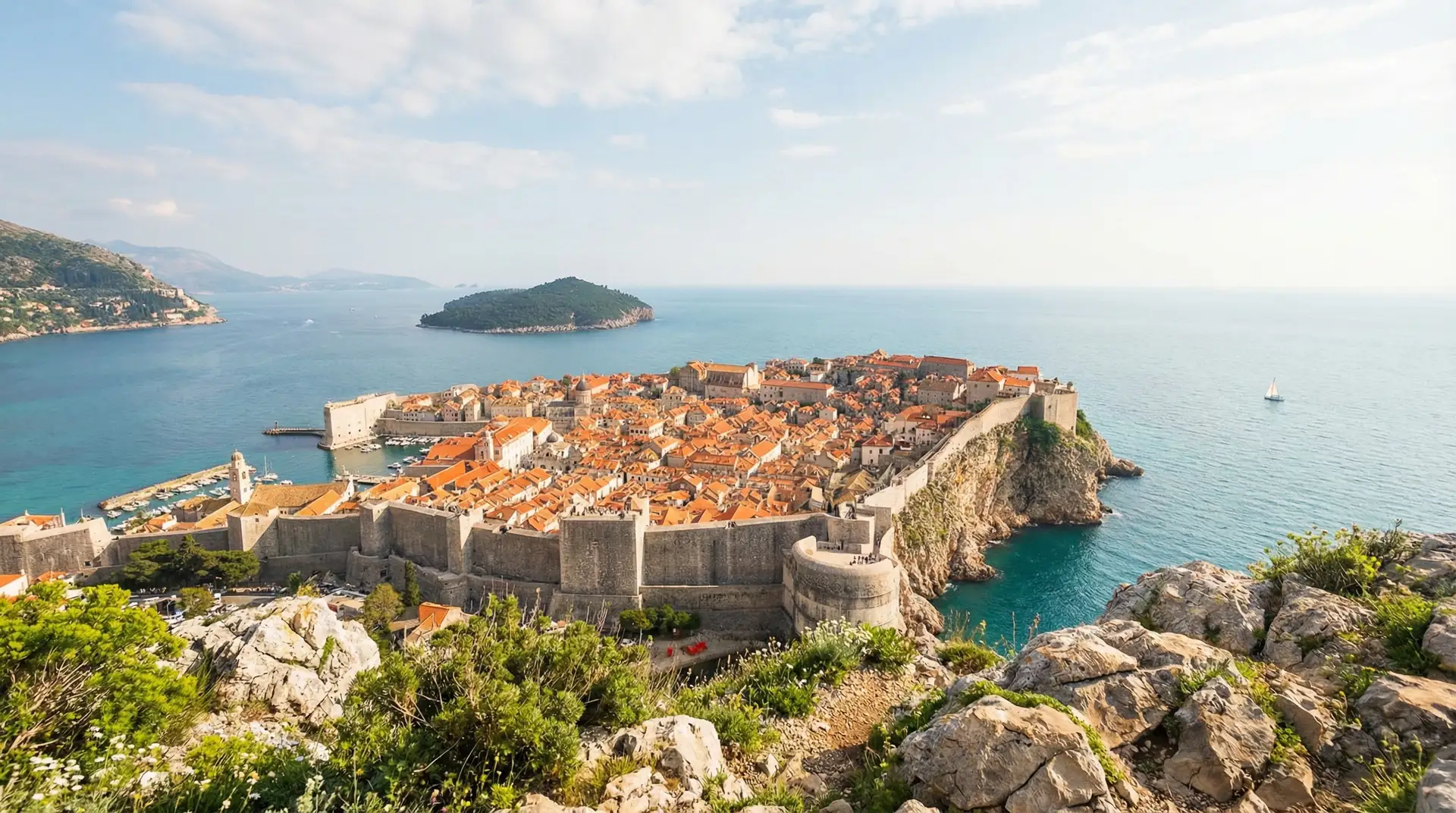 Dubrovnik old town with terracotta rooftops and Adriatic Sea coastline in Croatia — OraVisa Croatia visa services from Dubai