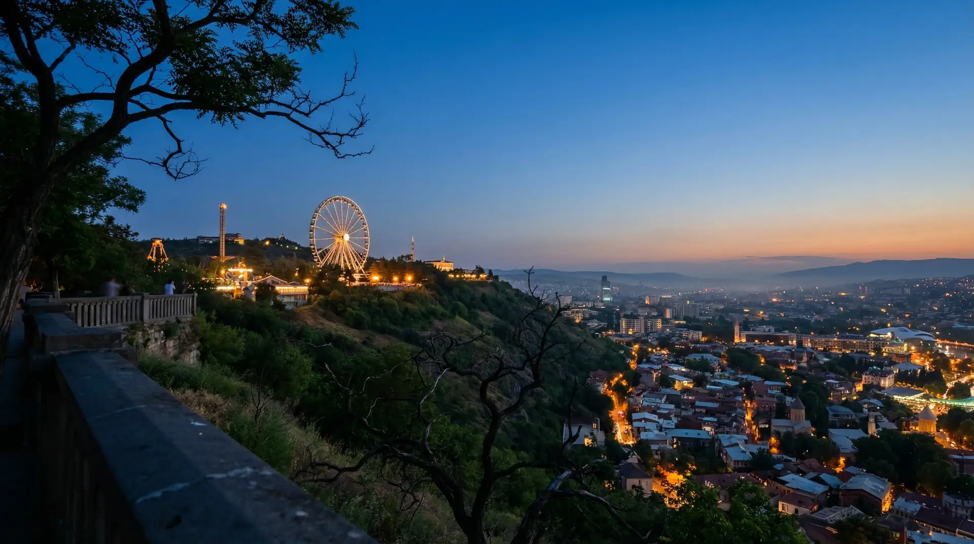 Tbilisi old town with colorful houses and Narikala Fortress overlooking the Kura River in Georgia — OraVisa Georgia visa services from Dubai