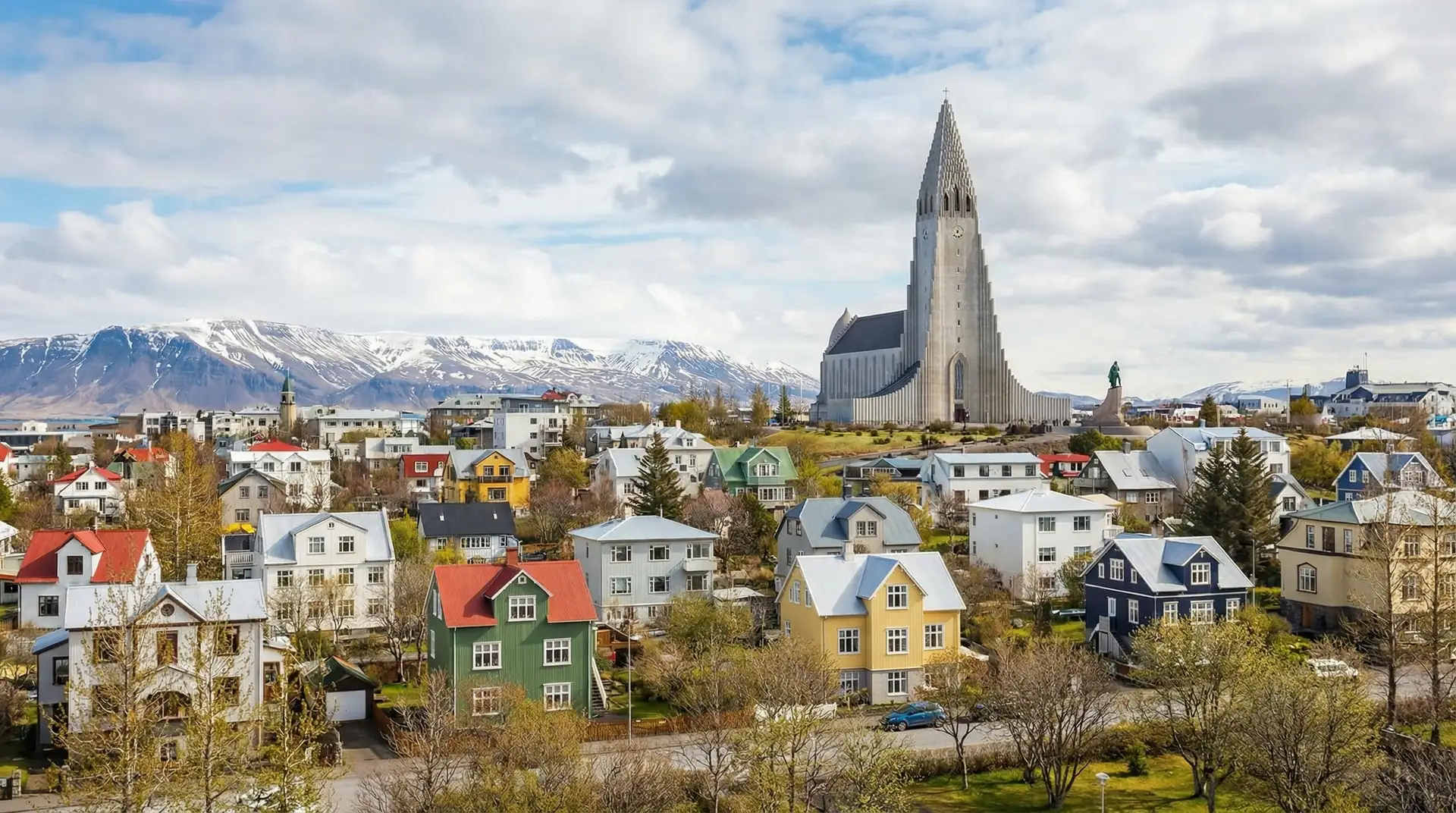 Dramatic Icelandic landscape with waterfalls and volcanic terrain in Iceland — OraVisa Iceland visa services from Dubai