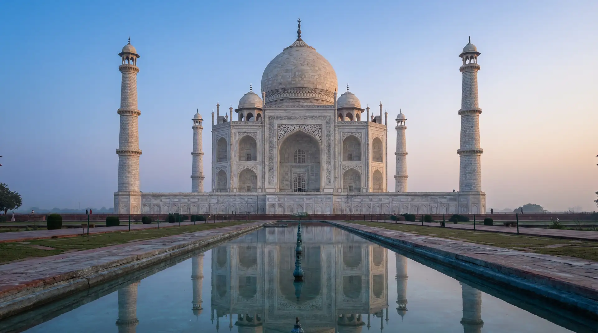 Taj Mahal with reflecting pool at sunrise in Agra, India — OraVisa India visa services from Dubai
