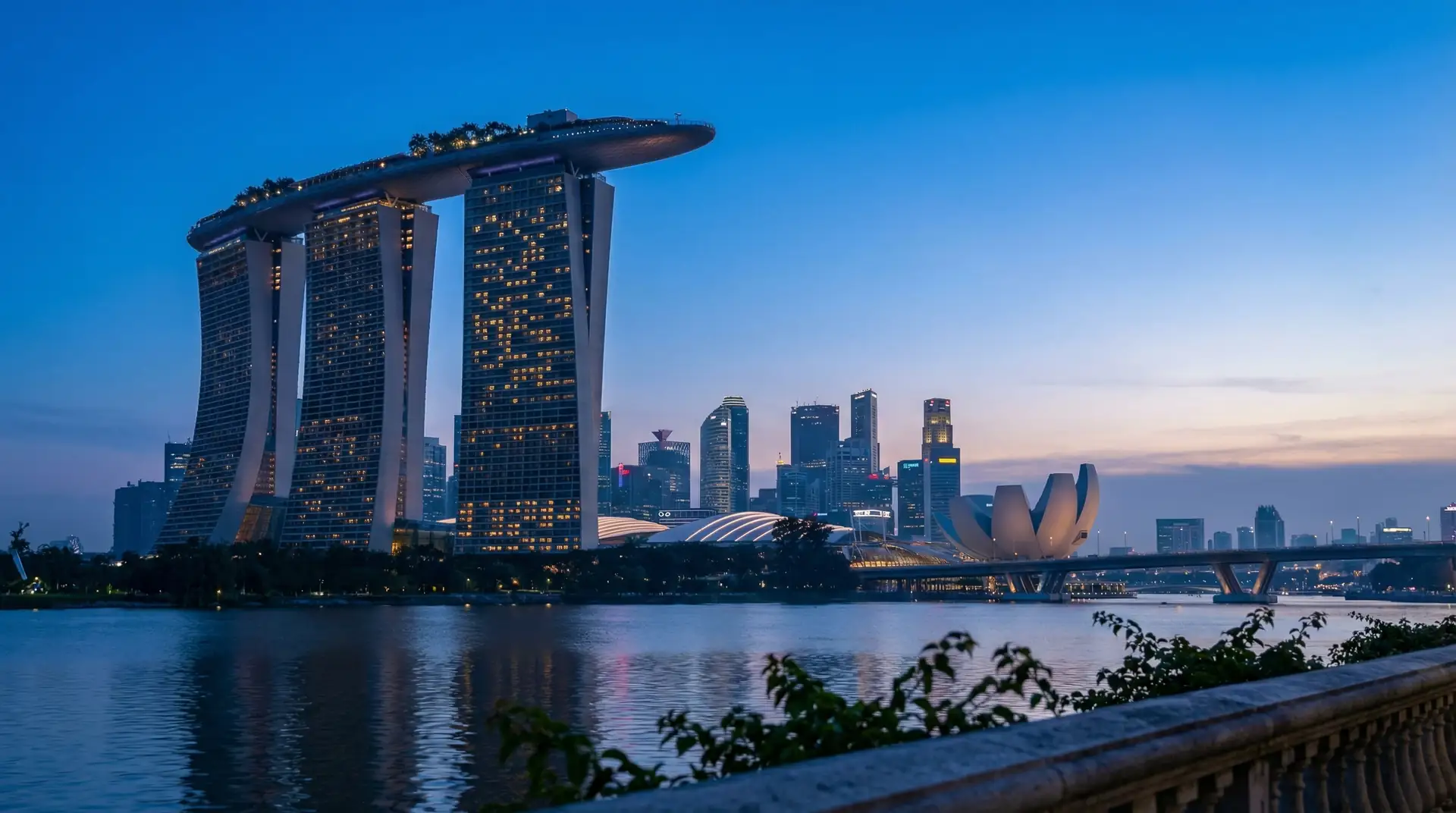 Marina Bay Sands and Singapore skyline at twilight — OraVisa Singapore visa services from Dubai