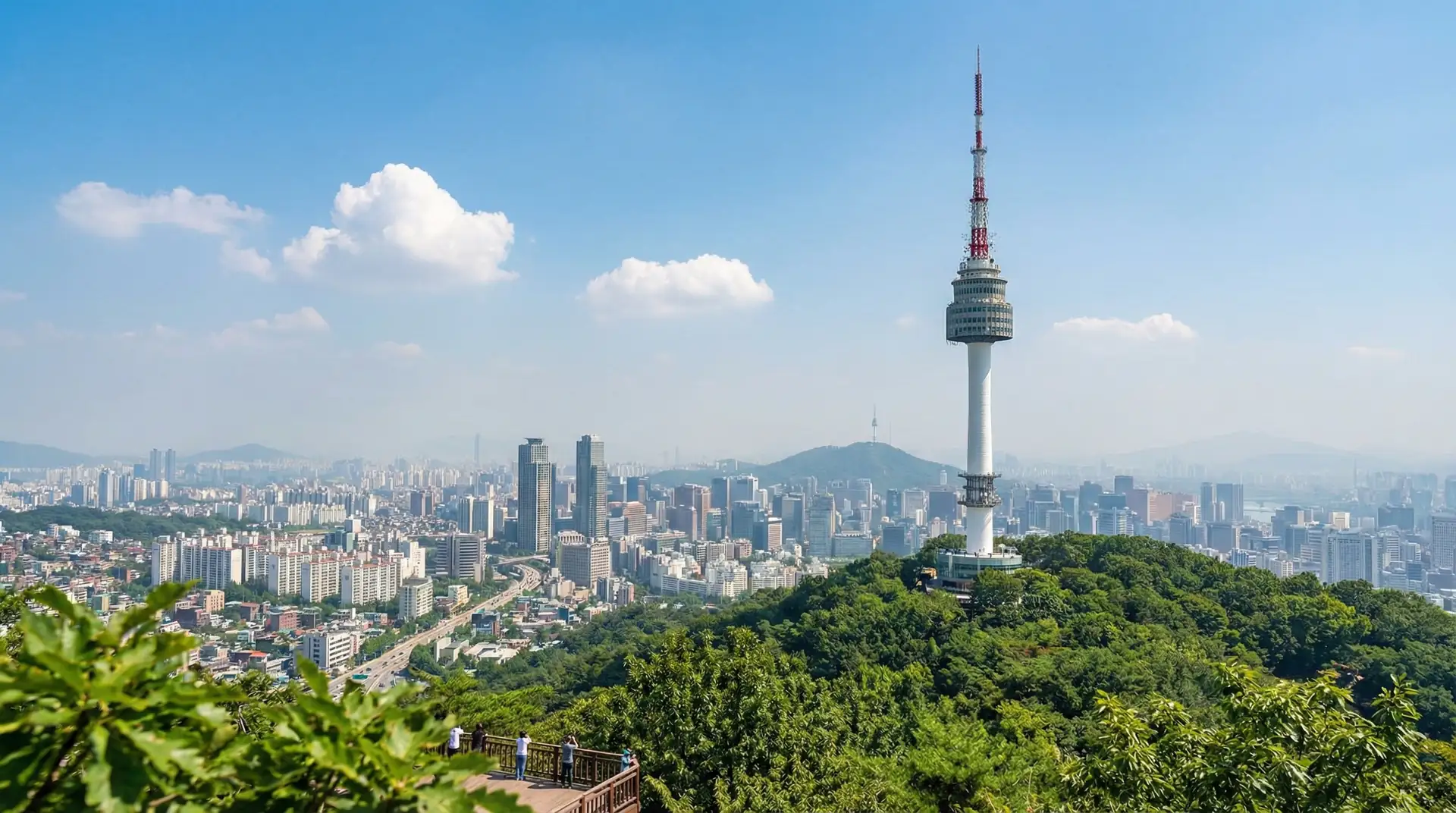 Gyeongbokgung Palace with cherry blossoms and Seoul skyline in South Korea — OraVisa South Korea visa services from Dubai