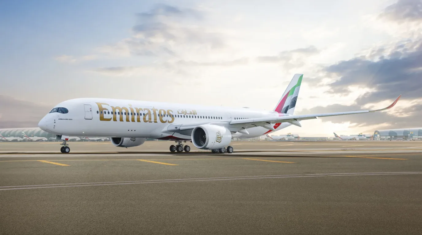 An Emirates Airbus A350 in flight, the aircraft type now operating the airline’s third daily service between Dubai and Cape Town from 1 July 2026.
